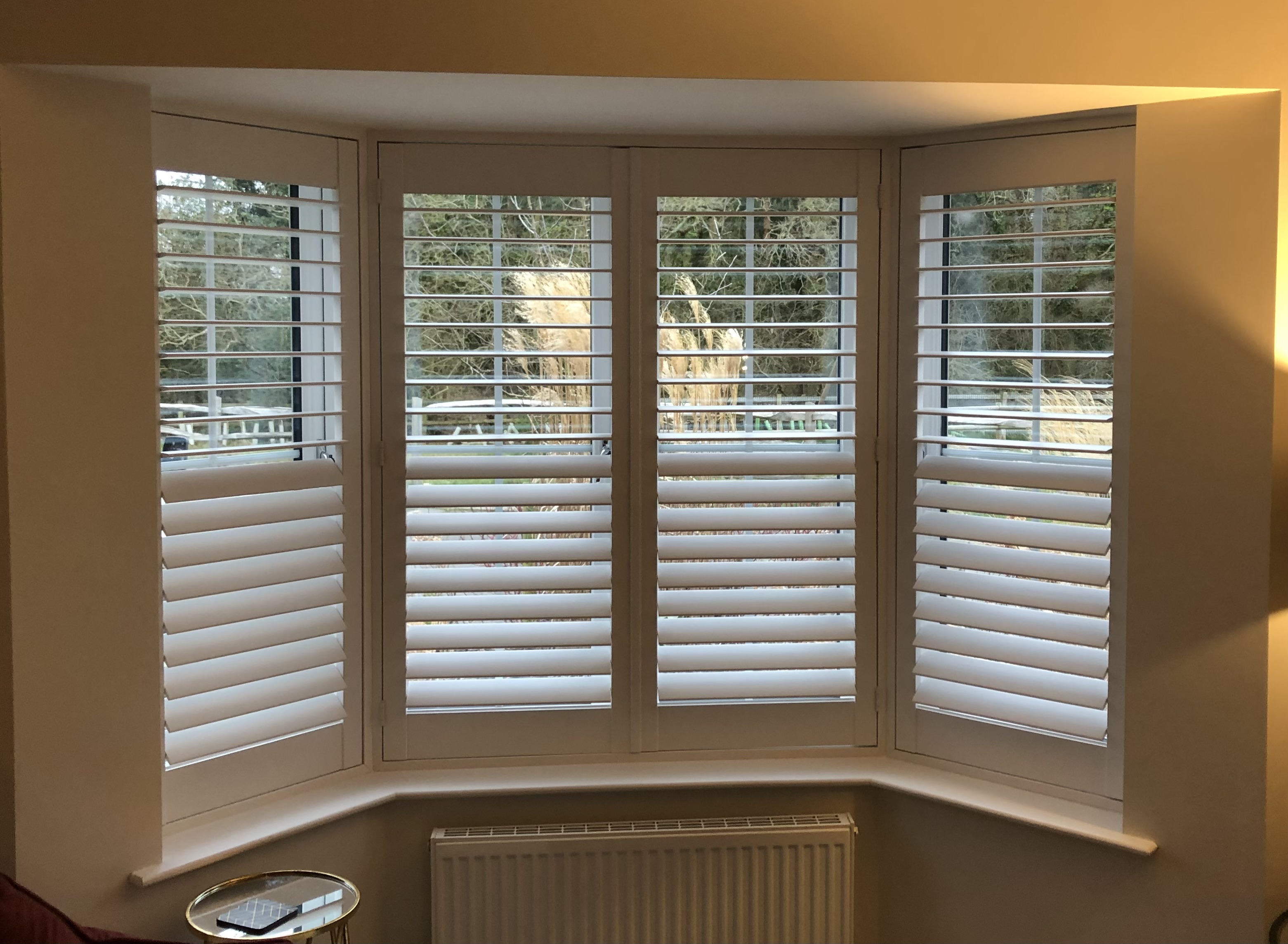 Bay window shutter installation by BeeSpoke