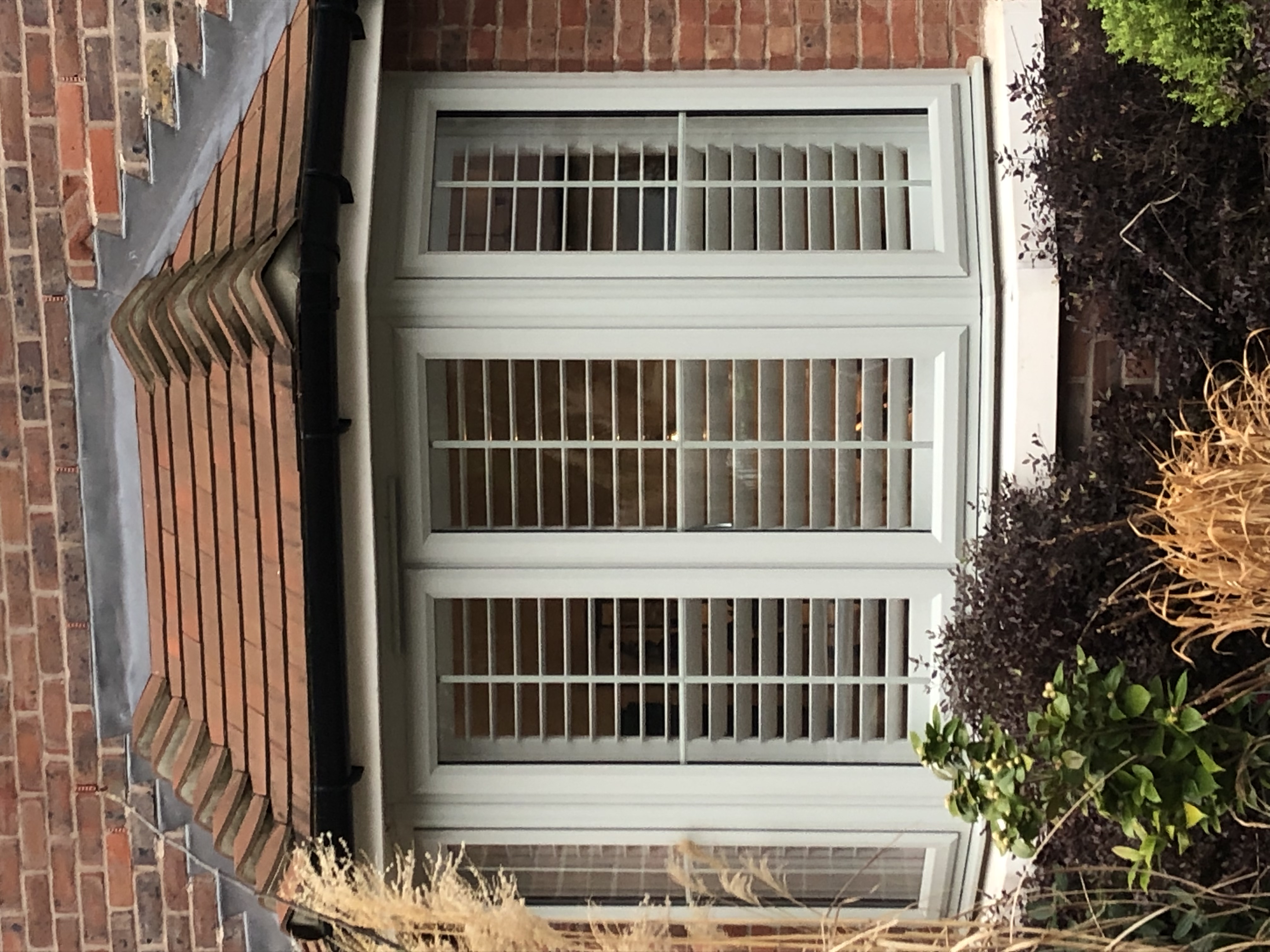 Large bay window shutter installation